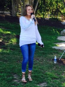 Olivia Helmund, 8th grader at CRMS and daughter of Alison and Mike Helmund, sang the national anthem in the beginning and “Amazing Grace” at the end of the National Day of Prayer event. 